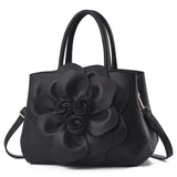 Bolsa Floral Luxe em Couro Impermeável