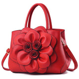 Bolsa Floral Luxe em Couro Impermeável